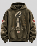 Chiefs Dynasty Trophy Hoodie — front, washed olive with large silver trophy graphic and championship Roman numerals