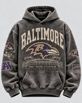 Ravens Stadium Archive Hoodie — front, vintage charcoal with Baltimore Raven logo, large varsity lettering and M&T Bank Stadium graphic